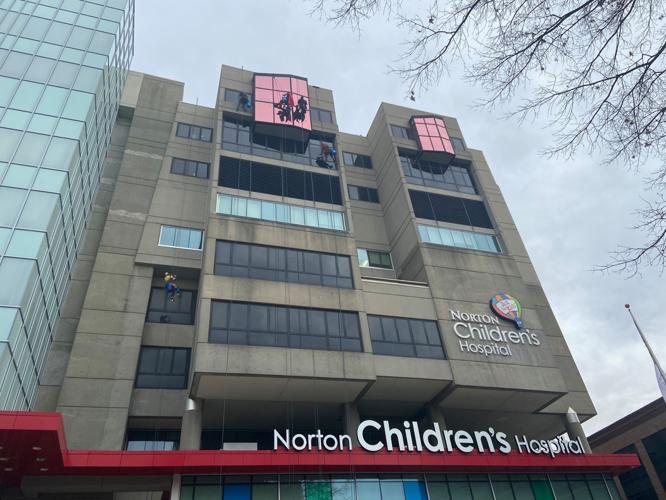 Superhero window washers at Norton Children's Hospital - Feb. 3, 2020