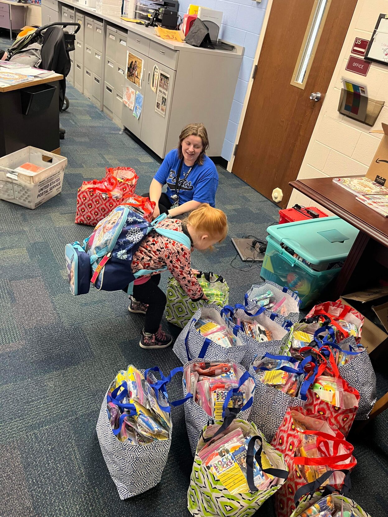 Zoe Radford Hands out Socks