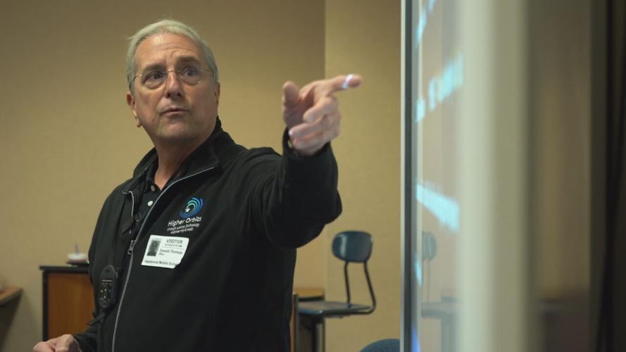 Astronaut Don Thomas, Ph.D., visits with Hazelwood Middle School students