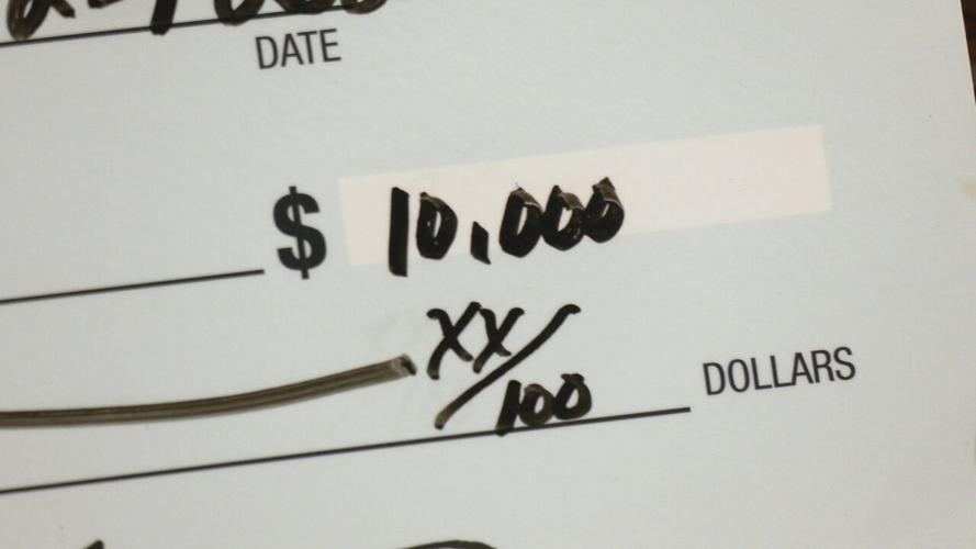 Passport Health Plan $10,000 donation to Neighborhood House