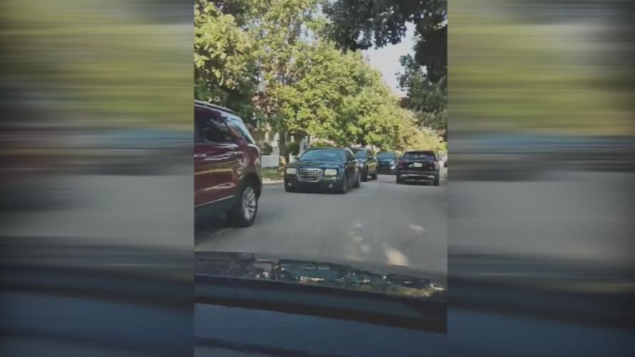 Cars backed up outside JCPS school on 1st day of classes in Louisville, Ky.