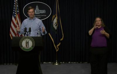 Gov. Andy Beshear and Virginia Moore