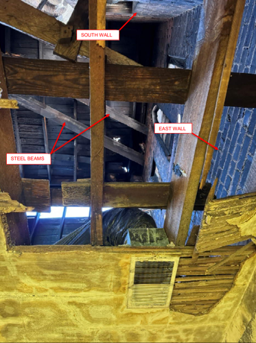 St. Paul's damage return wall and bracing on east facade.PNG