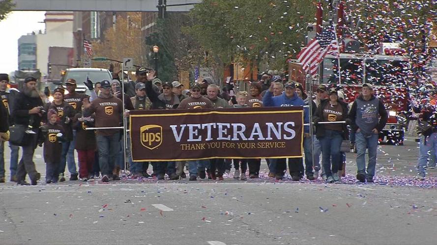 UPS employees march in Veterans Day Parade in downtown Louisville