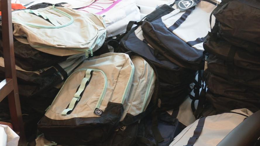 Winton and Hiestand law firm backpack giveaway 7-21-23
