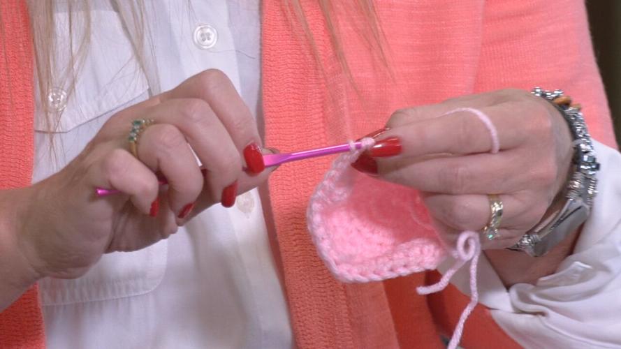 Jill Schurman knits NICU baby hat