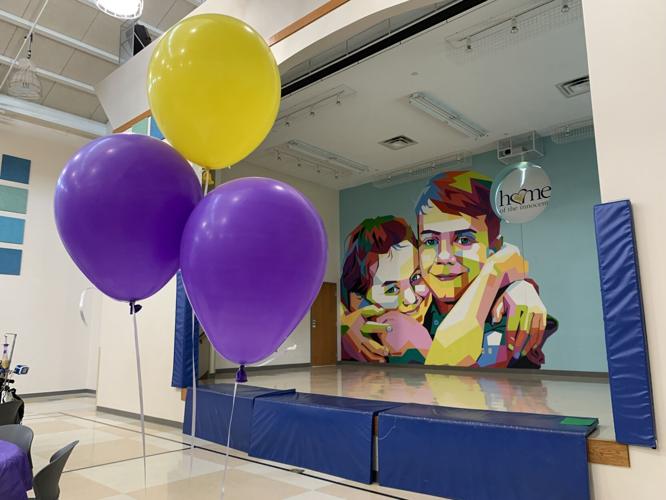 Home of the Innocents balloons and stage