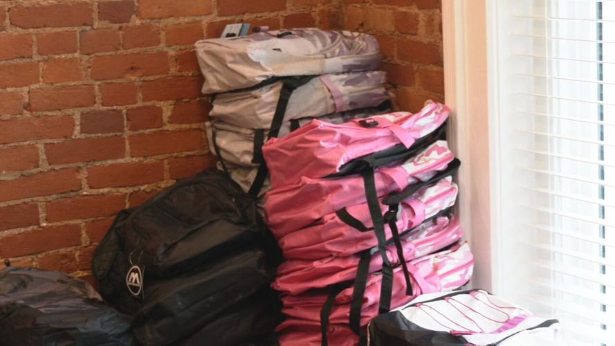 Winton and Hiestand law firm backpack giveaway 7-21-23