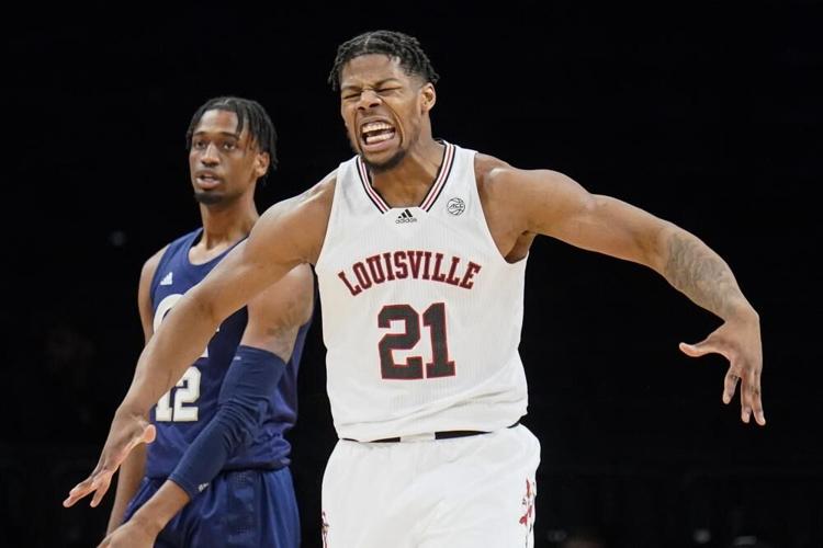 Louisville's Sydney Curry reacts after scoring against Georgia Tech.jpeg