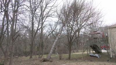 Windstorm damages Louisville property