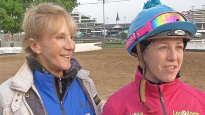 Sophie Doyle and her mom Jacqui on the backside at Churchill Downs