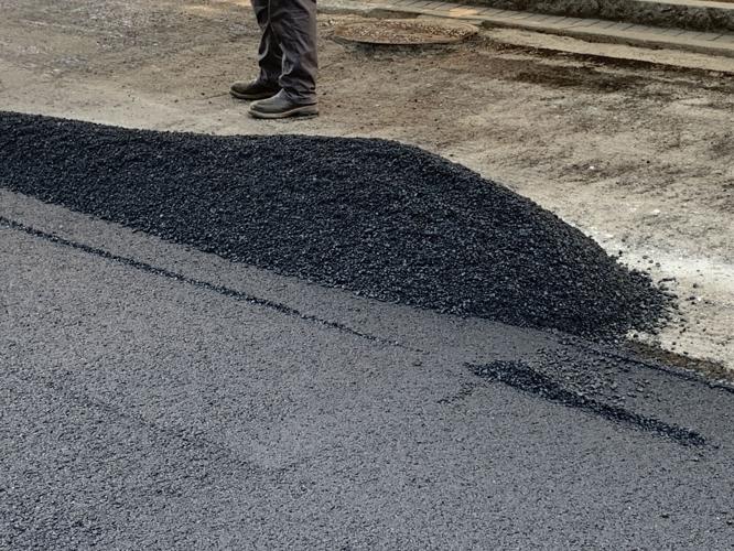 A newly paved road in downtown Louisville on July 26, 2023
