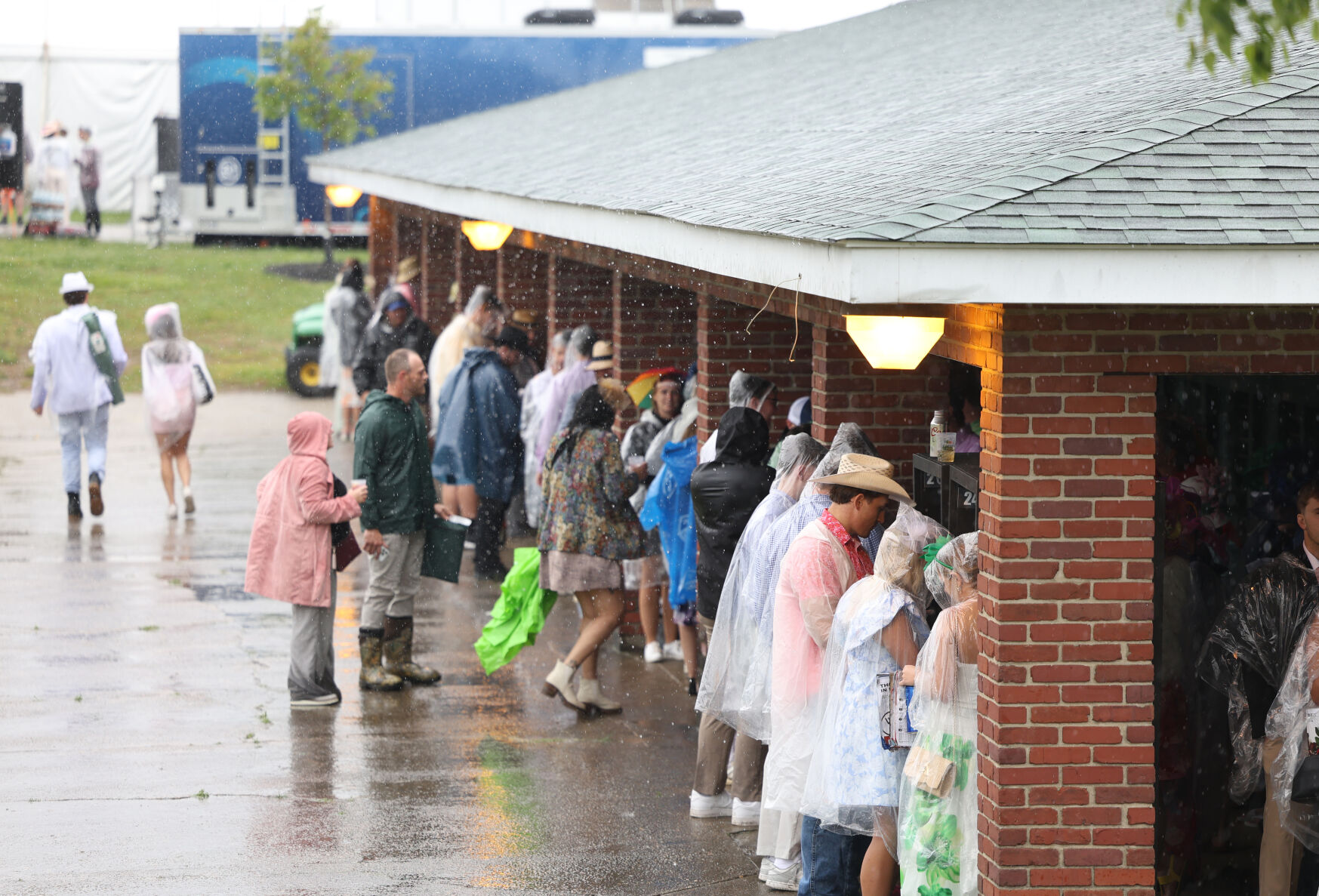 Rain falls near wager window.JPG