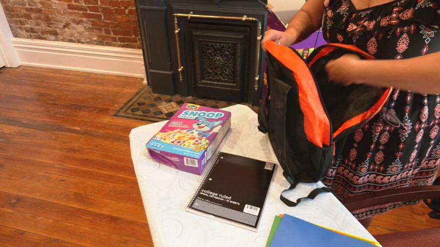 Winton and Hiestand law firm backpack giveaway 7-21-23