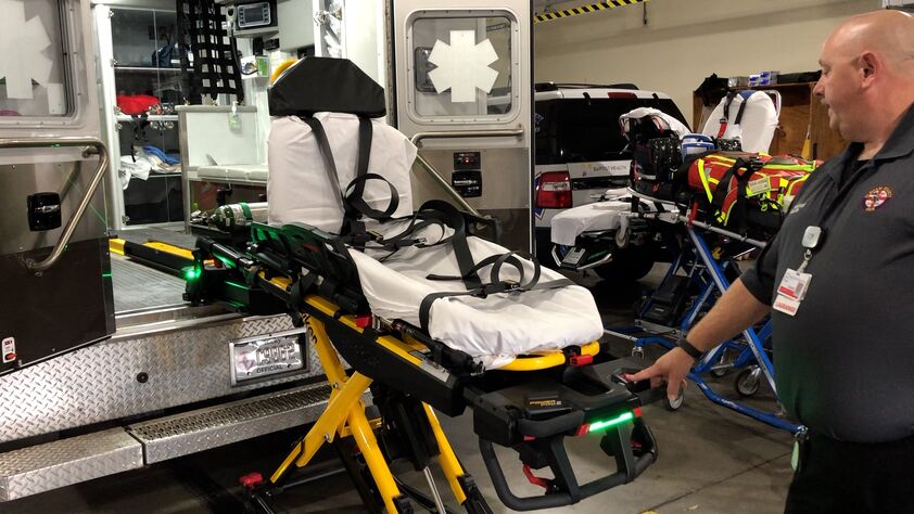 Oldham County EMS first responder using a Stryker PowerPRO2 power cot
