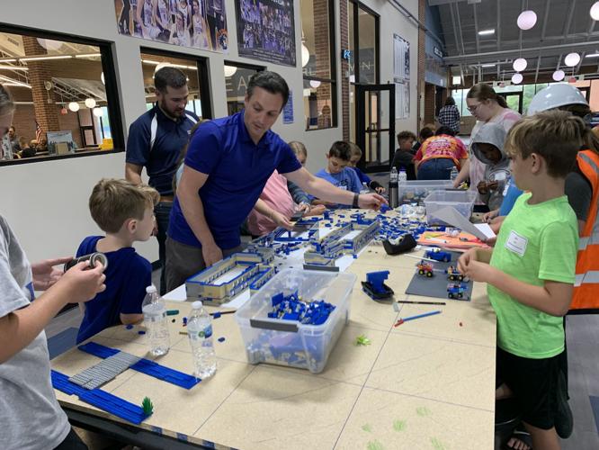 Children build Lego sets in Charlestown.jpeg