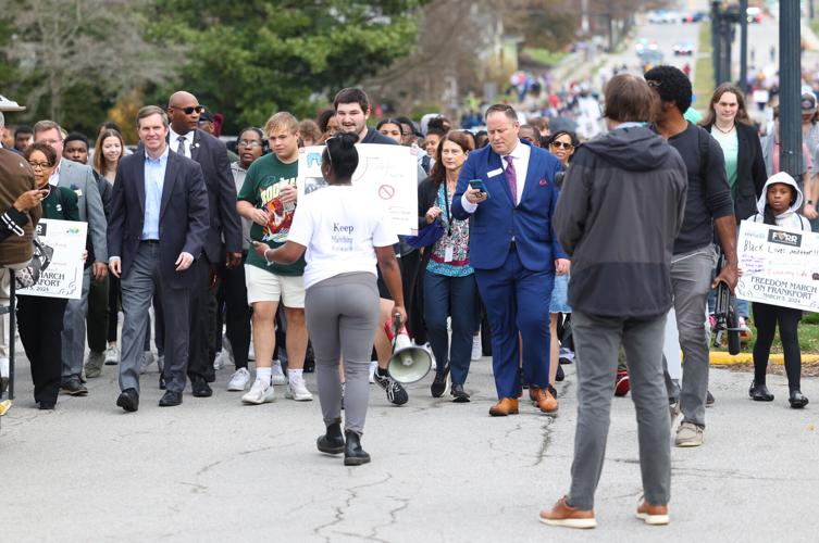 Crowd moves down road during March on Frankfort.JPG