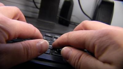 Typing at keyboard computer generic