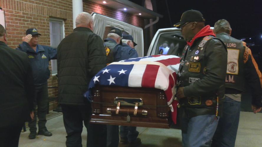 Veterans carry remains of WWII infantryman Private First Class Charles W. Wells