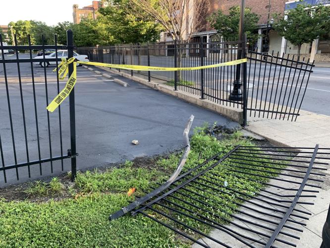 Broken fence near Hotel Louisville
