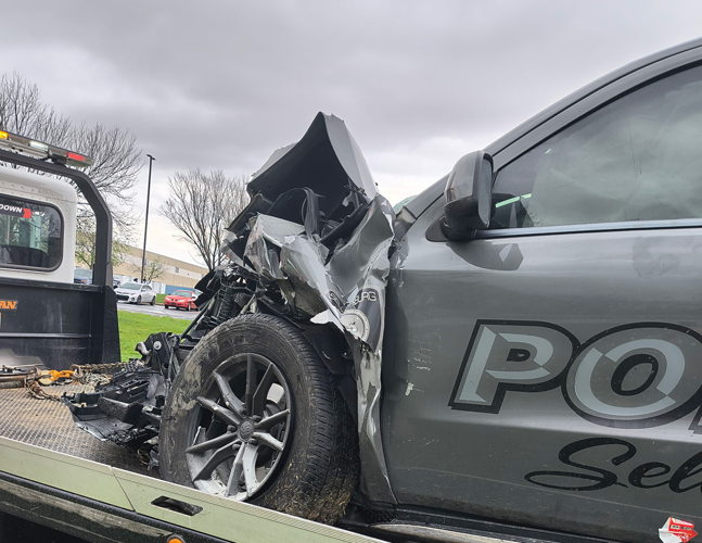 Damaged Sellersburg SUV on wrecker in Clark County, Indiana