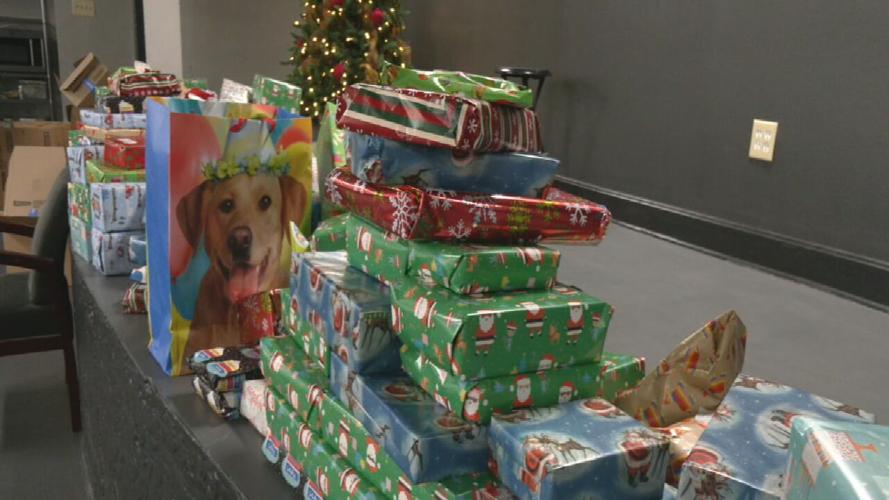 Ashton Gillotte wraps gifts at The Lord's Kitchen 12-18-24