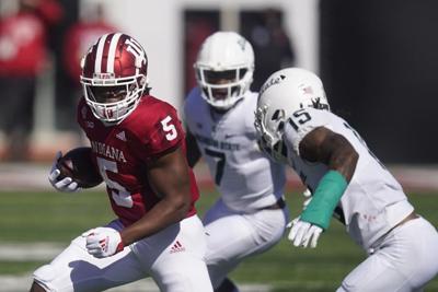 Indiana Stephen Carr tackled by Michigan State's Angelo Grose.jpeg