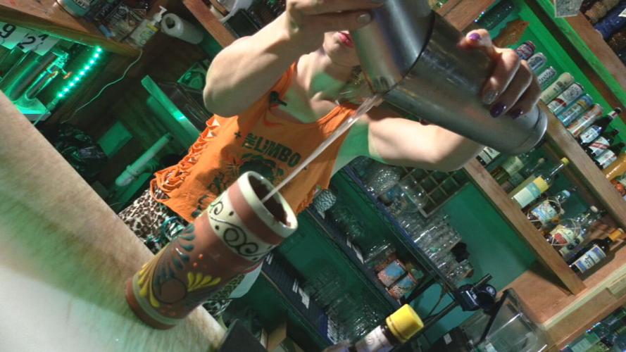 Tiki Bar pouring drinks