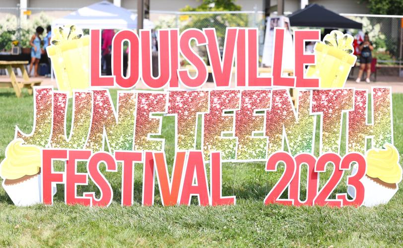 Louisville Juneteenth Festival signage at event.JPG