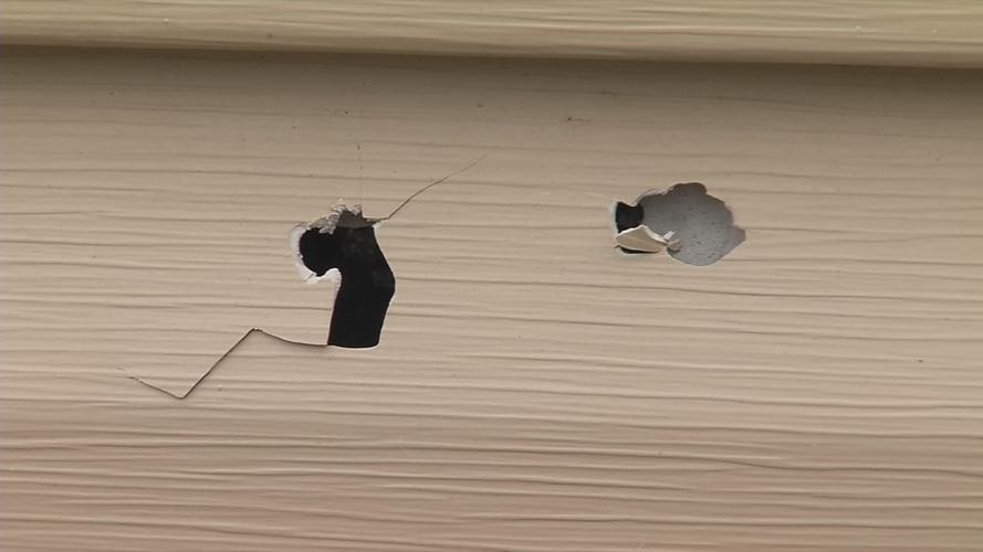 Bullet holes at N&T Smoker's Outlet - 500 Beecher Street