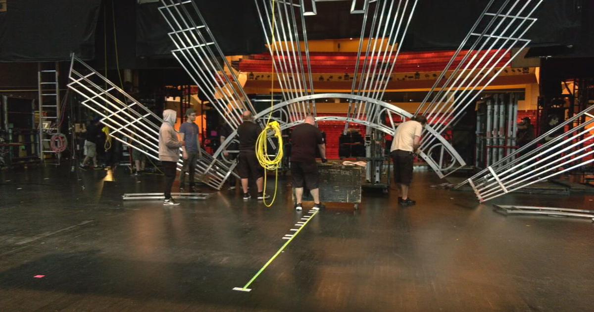 Stage crews prepare Whitney Hall for the return of 'Wicked' to downtown