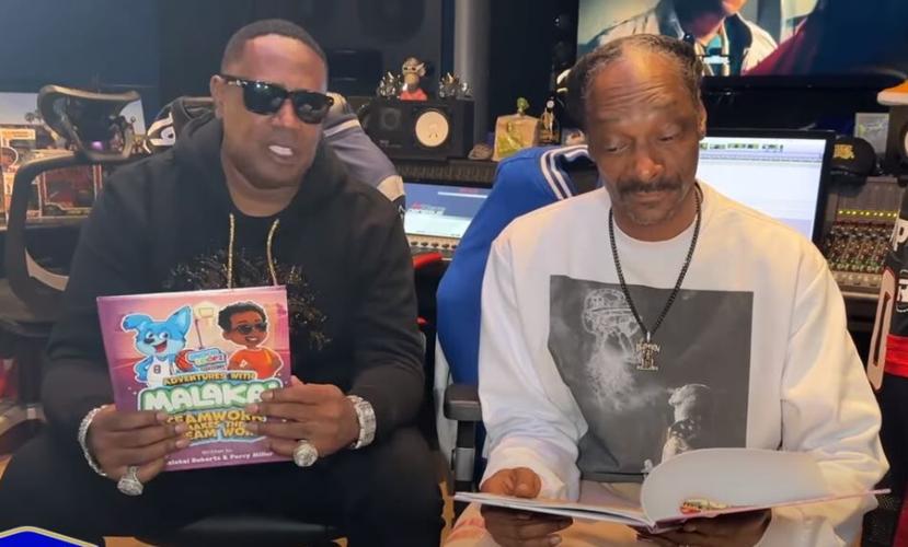 Master P and Snoop Dog with Malakai book.JPG