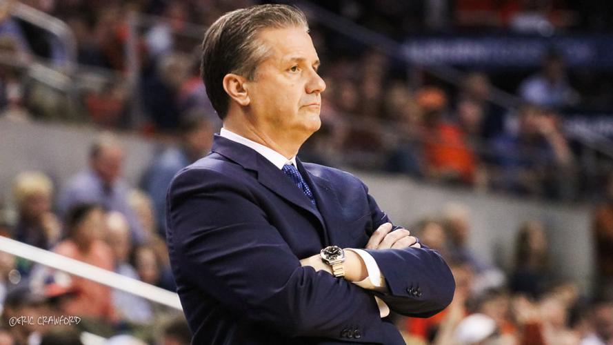 Calipari arms folded