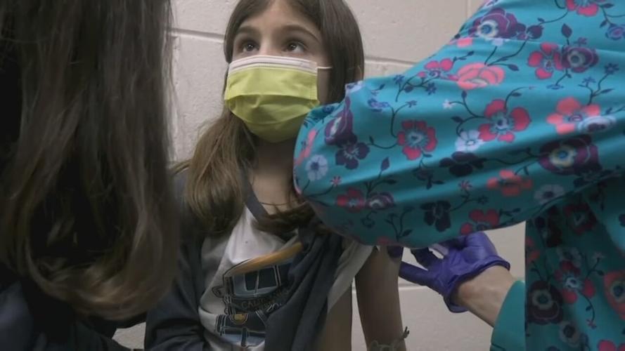 Child receiving vaccination