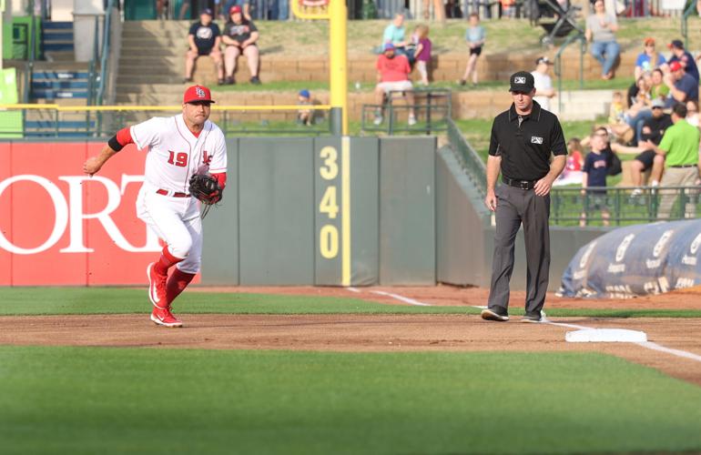 Joey Votto runs to first base bag.JPG