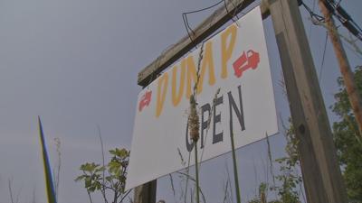 'Dump Open' sign outside Bullitt County landfill owned by Virgil Warren