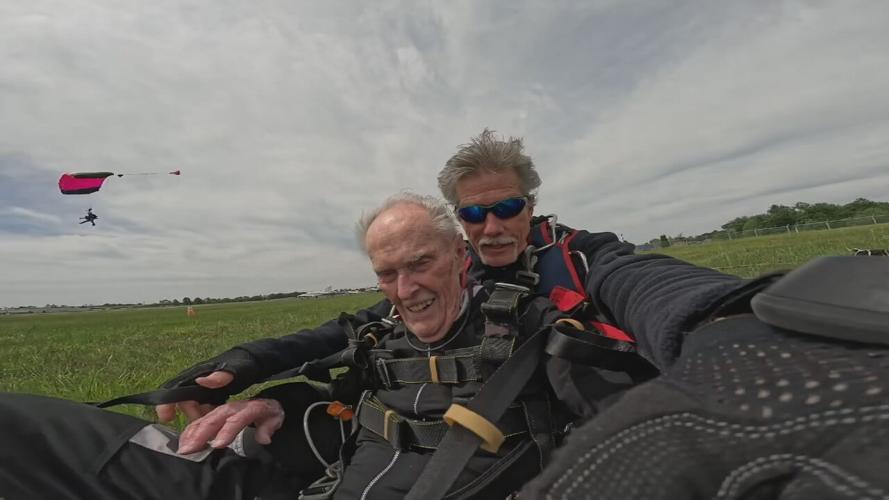 Lee Smith WWII veteran skydives for 100th birthday