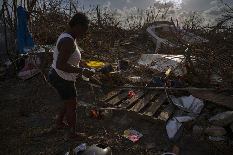 Tereha Davis, 45, holds a plate of rice