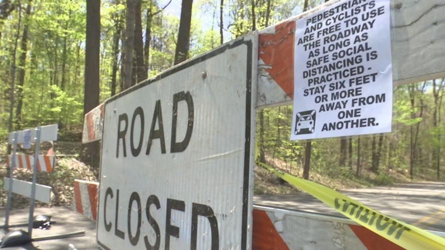 Road closed sign at Louisville park due to COVID-19