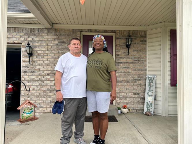 SYDNEY THOMAS MOM AND STEP FATHER 1.jpg