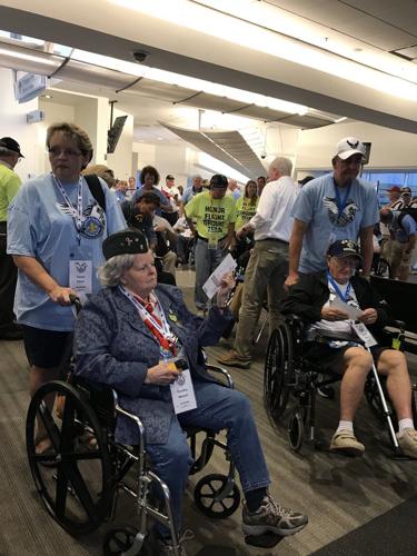 Honor Flight Bluegrass Crowds Departing Airport
