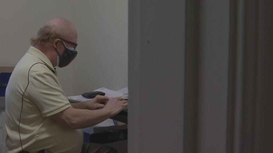 Dr. Fred Johnson, 70, searches for a COVID-19 vaccination appointment