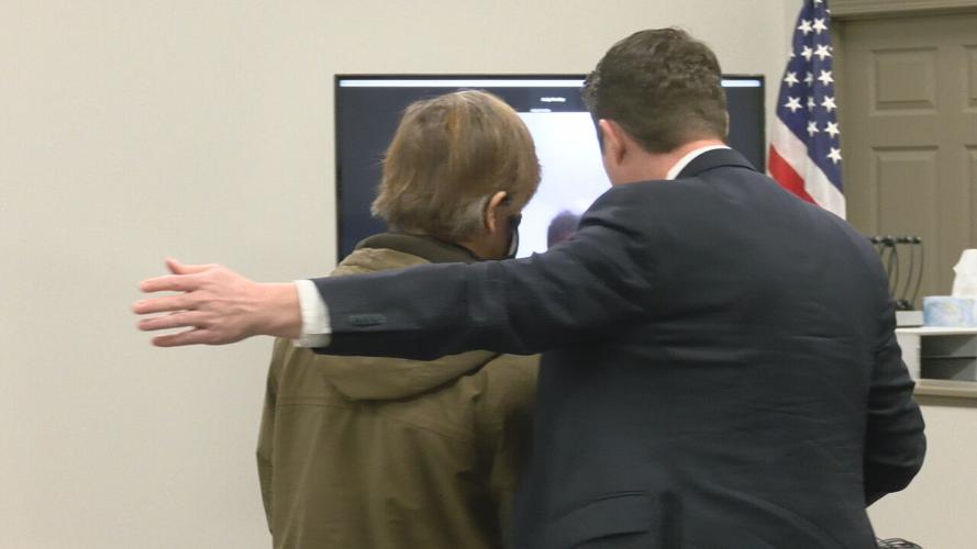 Attorney shields JCPS teacher Michael Mascardo during Jan. 25, 2023 court appearance