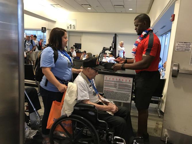 Honor Flight Bluegrass Vet at Boarding Gate