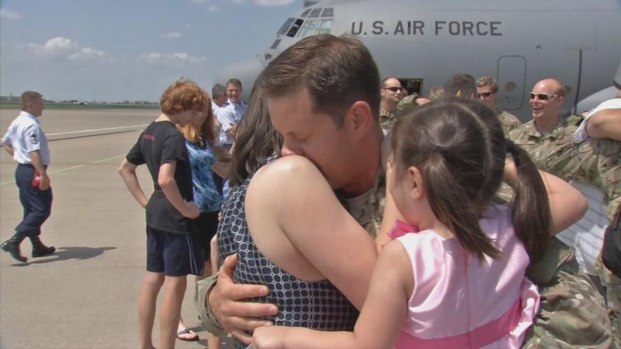 Family goodbye at deployment ceremony for 206th Engineer Battalion of the Kentucky National Guard