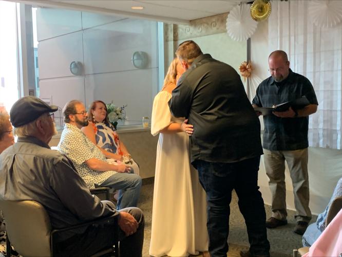 Baptist Hospital Floyd wedding, couple's first kiss - 5.19.23