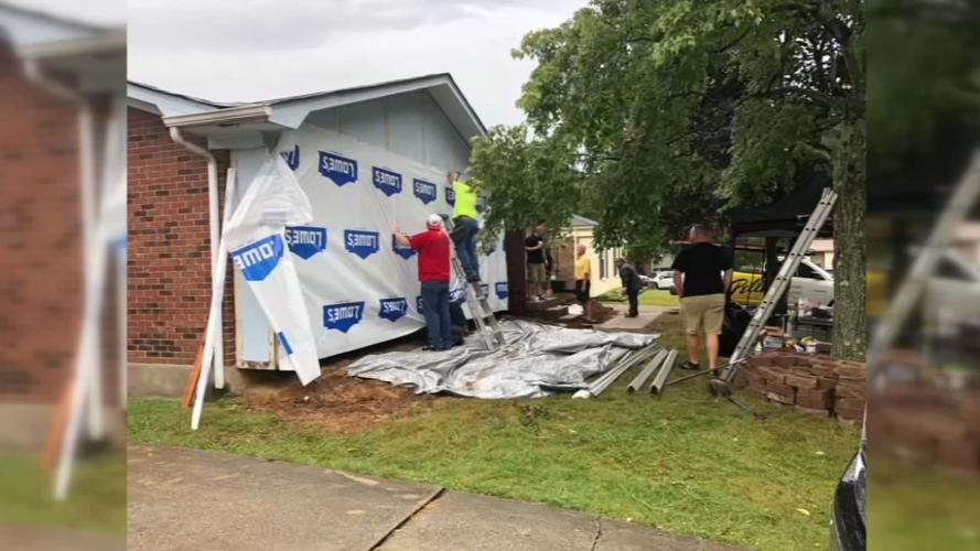 Firefighters work on home renovations