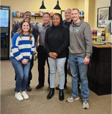 SYDNEY THOMAS WITH FIREFIGHTERS edit.jpg