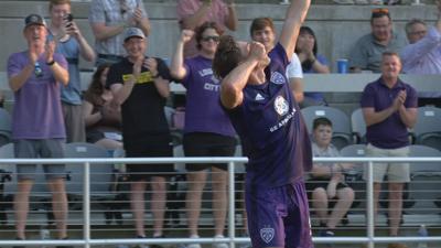 LouCity player celebrates