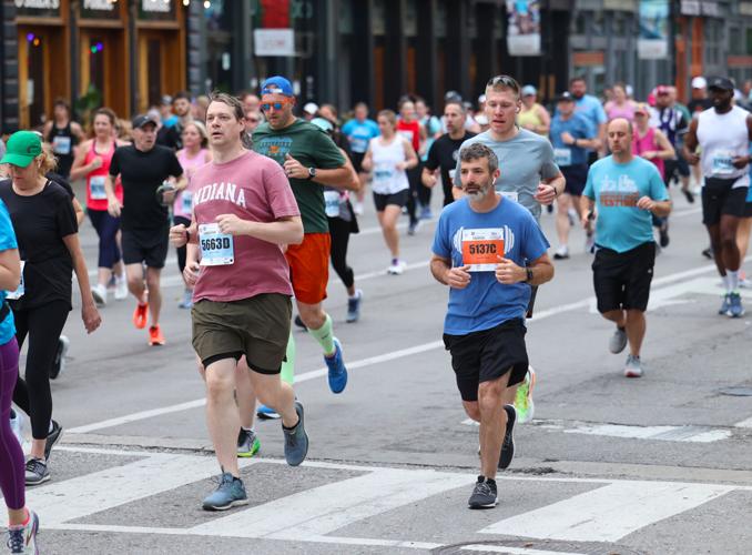People run in Marathon on Main Street.JPG
